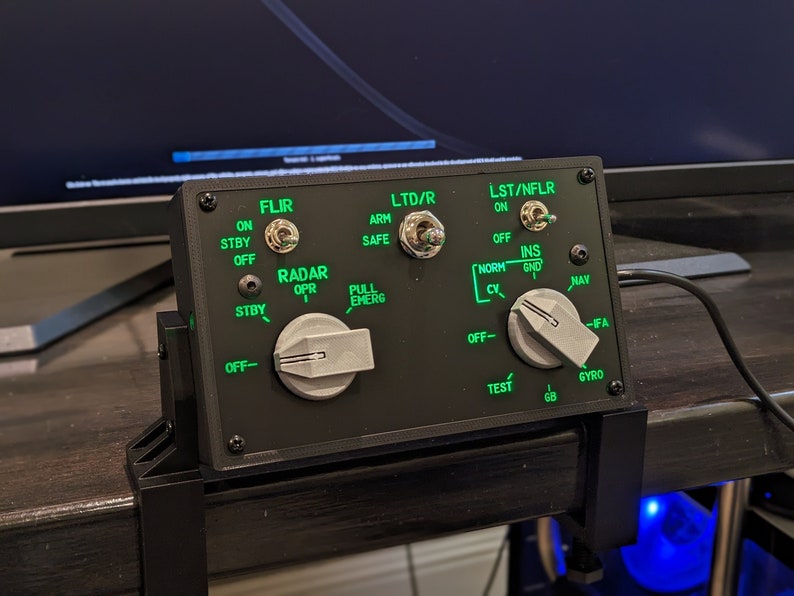 F-18 sensor panel with green backlit controls